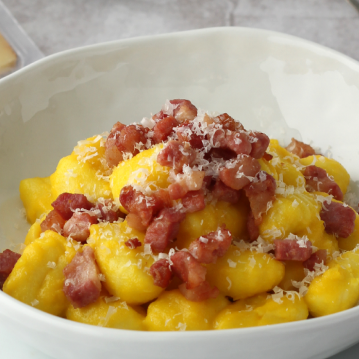 Gnocchi with Piave PDO, saffron and crispy bacon